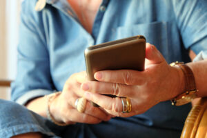 A senior citizen using a smartphone