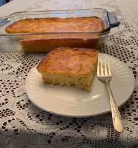 A slice of home made corn pudding.