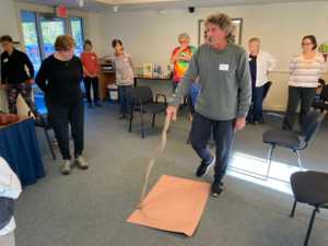 Steve Ingram leads a tai chi class during a Friends Together session at the Town Office.