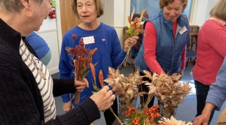 Participants in a 2022 Friends Together program create dried-flower arrangements with guidance from the Harpswell Garden Club. (Lili Ott photo)